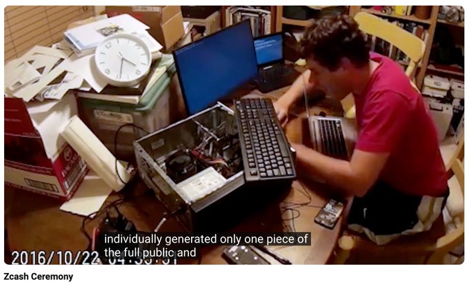 A video still from a 'Zcash Ceremony' dated 2016/10/22, showing a man in a red shirt working with an open computer case, keyboard, and laptop, with subtitles mentioning 'individually generated only one piece of the full public and'.