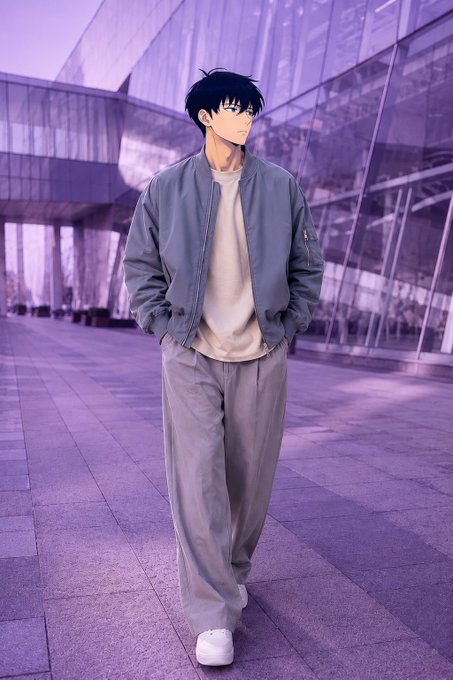 An anime-style illustration shows a young man with black hair wearing a gray bomber jacket, white shirt, and gray pants standing in an urban setting with a purple color tone.