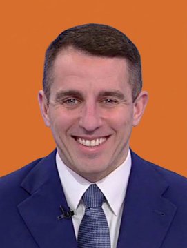 A man in a blue suit and patterned tie smiles broadly against a solid orange background, likely representing Anthony Pompliano, a well-known Bitcoin advocate, whose commentary accompanies the image discussing capital flows from stablecoins to Bitcoin and bullish market conditions.
