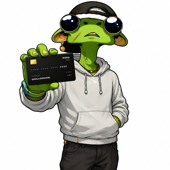 Digital art of a green frog character wearing a white hoodie, sunglasses, and a cap, holding a black Xora credit card with the name 'EMIOLA EMMANUEL'.
