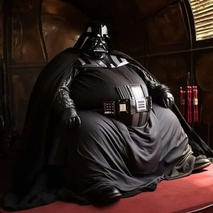 The image shows a very obese version of Darth Vader, the iconic Star Wars villain, dressed in his traditional black armor and cape while seated. The caption "Diet Bitcoin" humorously suggests that despite being heavy in appearance, the character represents something with minimal actual value, parodying how "diet" versions often claim reduced impact while the real thing (Vader's imposing bulk here) is far more substantial.