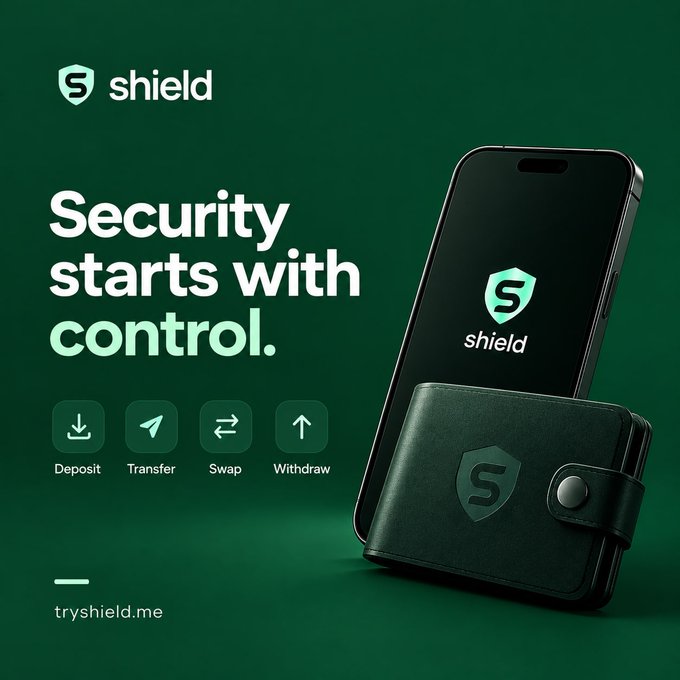 A green-themed advertisement for 'shield' cryptocurrency wallet featuring the tagline 'Security starts with control.' along with icons for Deposit, Transfer, Swap, and Withdraw, showing a phone and leather wallet with the shield logo, and URL tryshield.me.