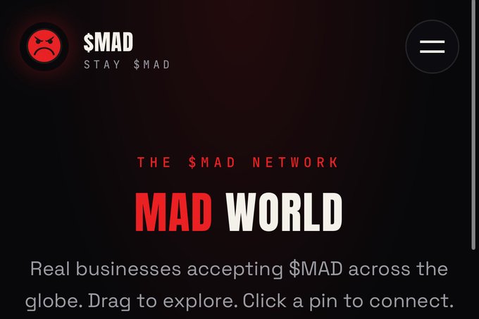 A dark-themed webpage featuring the $MAD logo with the slogan 'STAY $MAD,' promoting 'MAD WORLD' and 'THE $MAD NETWORK' for businesses accepting $MAD globally.