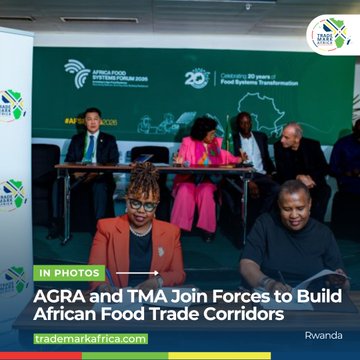 A photo of people seated at a signing ceremony with the caption 'IN PHOTOS: AGRA and TMA Join Forces to Build African Food Trade Corridors' and 'Rwanda' displayed.