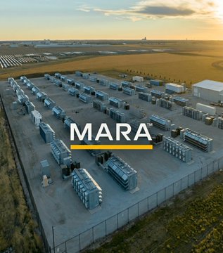 The image shows an aerial view of a large industrial area with numerous power plants or solar panels. The text "MARA" can be seen in the image as well. There are also some buildings visible, which might be related to the power generation process. The main focus is on the power plants and their arrangement within the industrial complex.