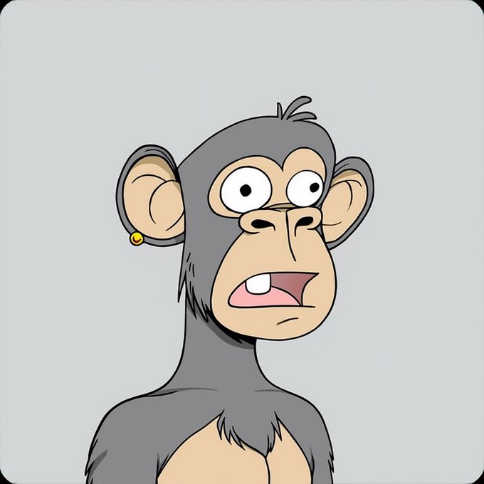 An animated illustration of a gray monkey or ape character with large, wide eyes, an open mouth showing teeth, and a small yellow earring in its left ear.