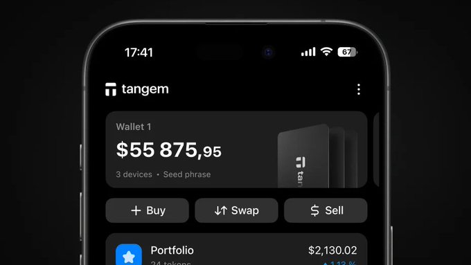 A smartphone screen displays the Tangem crypto wallet app, showing 'Wallet 1' with a balance of '$55 875,95', along with Buy, Swap, and Sell buttons.