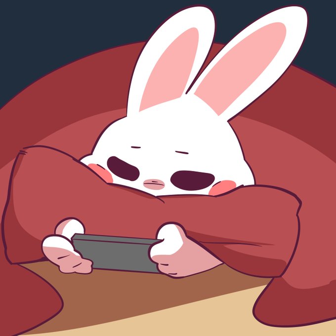 A cute white cartoon bunny with pink-tipped ears is tucked cozily under a red blanket, holding a phone with sleepy eyes and a content smile—perfectly matching the relaxing vibe of "$buni chilling right now."