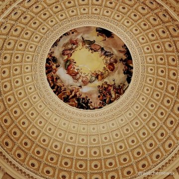 An ornate domed ceiling fresco depicting classical figures radiates outward with intricate gold and cream patterns, evoking the grandeur of a legislative chamber where historic decisions like the Clarity Act cloture vote are made. A watermark in the bottom right reads "©ZachIngle.us."