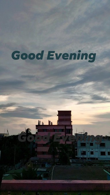 An evening cityscape photo with a cloudy sky over buildings, overlaid with the text 'Good Evening' appearing twice in the image.