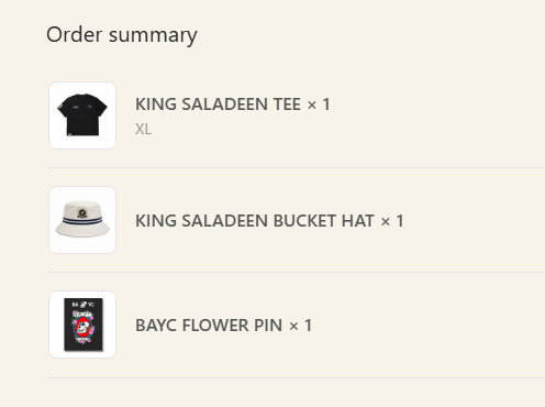 An order summary showing three merchandise items: KING SALADEEN TEE × 1 (XL), KING SALADEEN BUCKET HAT × 1, and BAYC FLOWER PIN × 1.