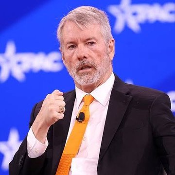 Michael Saylor, executive chairman of MicroStrategy, speaks passionately at a conference stage, gesturing with a clenched fist as he outlines his vision to transform $STRC into the "iPhone of Digital Assets."