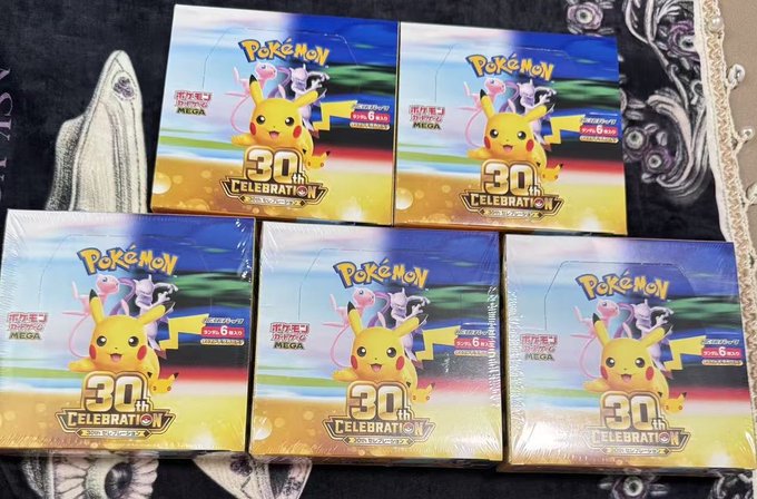 Five sealed boxes of Pokémon TCG '30th Celebration' booster packs, each containing 6 packs and featuring Pikachu and Mewtwo on the cover.