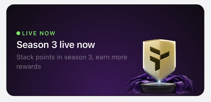 The image features a purple background, an award for season 3 of a TV show or movie, and text that reads "Live Now Season 3 Live now Stack points in season 3 Earn more rewards". The award has a gold shield with a black logo on top.