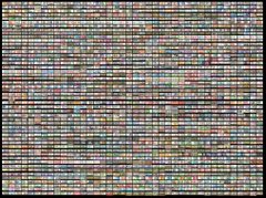 An abstract digital artwork composed of a dense grid of small rectangular cells filled with various muted colors and patterns, resembling a mosaic or pixelated texture.