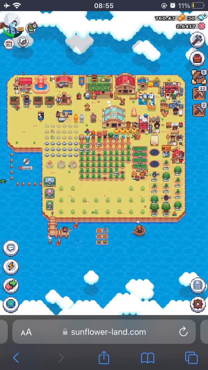 The image shows a screenshot of a video game interface displaying an island setting with various buildings and vehicles such as boats and cars. The text within the screenshot reads, "WEB3 GAME (Video Tutorial)> Become a 5-year-old web3 game ... 40,000 active users ... Active NFT market ... $FLOWER Token ... Total volume 110M ... 700,000 wallets with collectible items @0xSunflowerLand It' s not just a game, it'