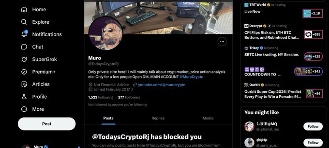 The image shows a Twitter/X profile page for "Muro" (@TodaysCryptoRj) with 1,523 followers and 377 following, displaying a banner photo of a workspace setup and the message "@TodaysCryptoRj has blocked you," indicating that the user who posted has been blocked by this crypto account. The accompanying post calling to "report" this account appears to be a retaliatory response to being blocked, as evidenced by the on-screen notification visible in the profile.