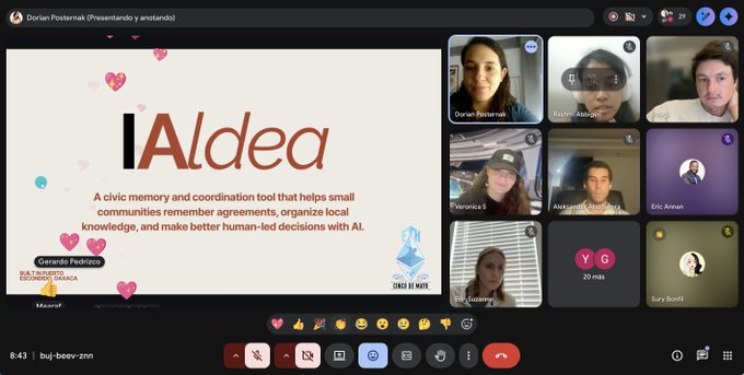 The image shows a group of people participating in an online meeting or webinar using a video conferencing platform like Zoom, Skype, or Google Meet. The participants are seen at various angles within the frame, indicating that they are engaged in a discussion or presentation related to IAldea.org and its purpose.