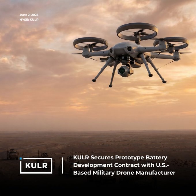 The image features a large gray drone flying through a desert landscape with a sunset sky as its backdrop. The text at the bottom of the image reads "KULR secures prototype battery development contract with U.S. -based defense drone manufacturer". This suggests that KULR is involved in the development and manufacturing of batteries for military drones, which are used to power these aerial vehicles during missions.