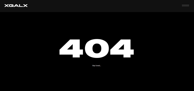 A minimalist black webpage displays a bold white "404" error message with "Stay Tuned..." beneath it, alongside the "XGALX" logo in the top-left corner, corresponding to the XGALAX website's placeholder for an upcoming announcement.