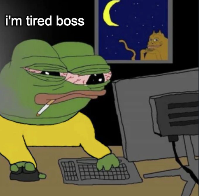 The image features a cartoon frog sitting at a desk with a computer monitor, keyboard, and mouse. The frog appears to be working or studying while smoking a cigarette. In the background, there are two cats - one yellow cat and one black cat. The text in the image reads "I'm tired boss", which is likely a reference to the cartoon character Frog from the popular animated series "The Simpsons".