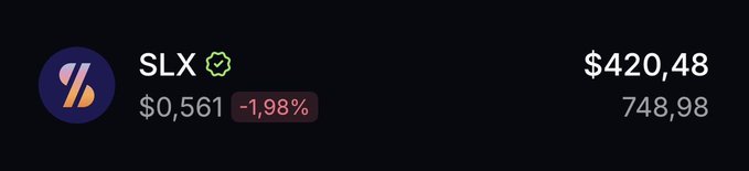 A cryptocurrency tracking interface displays the SLX token with a price of $0.561, showing a 1.98% decline, alongside a value of $420.48 (748.98 units) in white text on a dark background—appearing as a humorous response to a request for a Solana wallet address, as SLX is not a Solana-based token.