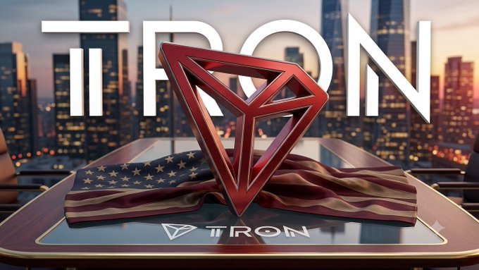 The image features a red TRON logo prominently displayed atop an American flag, with "TRON" written in large letters across a city skyline background and the TRON logo also visible on the surface below—symbolizing TRON's expanding presence and ecosystem strength in the U.S. crypto landscape.
