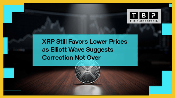 The image shows an XRP coin sitting on top of a wooden table, with a small amount of text above it that reads "XRP still favors lower prices as Elliott Wave suggests Correction Not Over". The background features a graph showing a downward trend in the value of the XRP token over time.