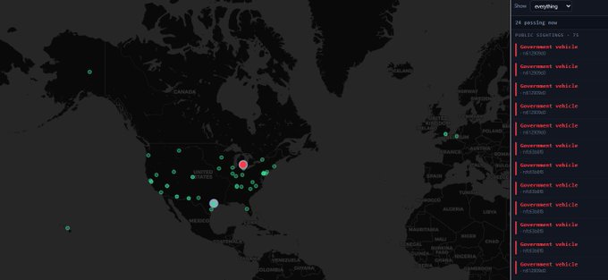 A dark map interface showing North America with teal and red dot markers, with a side panel listing '24 passing now' and 'PUBLIC SCORING - 74' along with multiple 'Government vehicle' entries containing hashtags like #WEAREONE, #WEONE, #WEAREFREE.