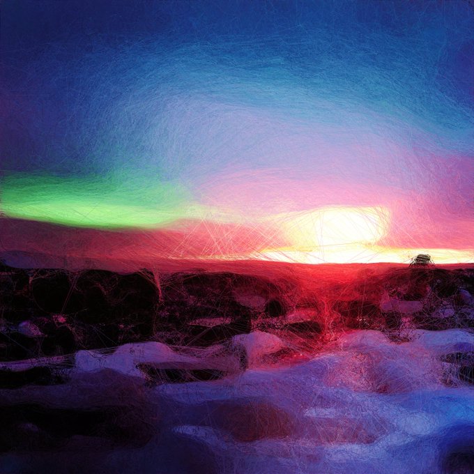 A vibrant, dreamlike landscape painting featuring a glowing sun on the horizon, with swirling skies in shades of blue, pink, green, and deep red above a shadowy, textured terrain. The dramatic color palette and scratchy, expressive brushwork create an otherworldly, almost surreal sunset scene.
