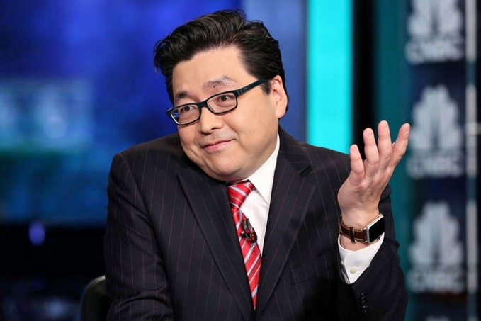 The image features a man wearing glasses who appears to be a news presenter. He is seated in an office chair with his hand up, possibly gesturing or making an announcement. The caption of the image suggests that he might have predicted the future price of Bitcoin for the first months of 2006. This information can give insights into the fluctuations and trends in the cryptocurrency market at that time.