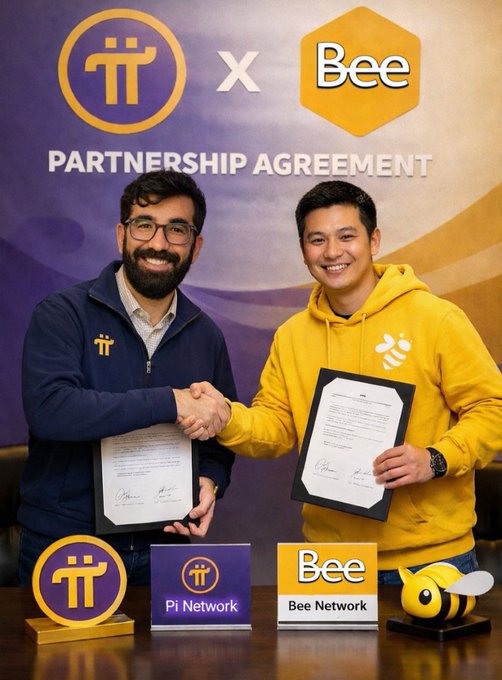 Two smiling men shake hands in front of a "PARTNERSHIP AGREEMENT" banner featuring the Pi Network and Bee Network logos, with each holding a signed document and branded placards displayed on the table between them—imagery that visualizes the X post's hopeful call for a collaboration between Pi Network and Bee Network to strengthen mobile mining.