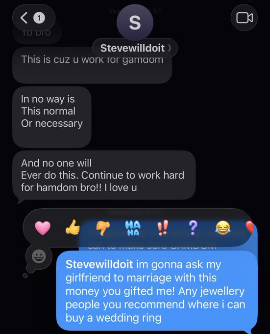 A user named "Stevewilldoit" sends a message telling someone the promotion is because they work for Gamdom, says it's not necessary but encourages them to continue working hard. The user then responds playfully asking for jewellery recommendations to buy a wedding ring with the gifted money, supporting the caption's claim of being the "world's best employee for Gamdom."