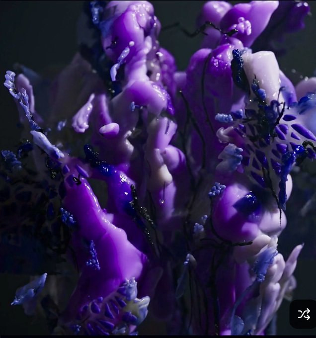 An abstract 3D digital artwork featuring vibrant purple, blue, and pale pink organic forms resembling coral or alien flora.
