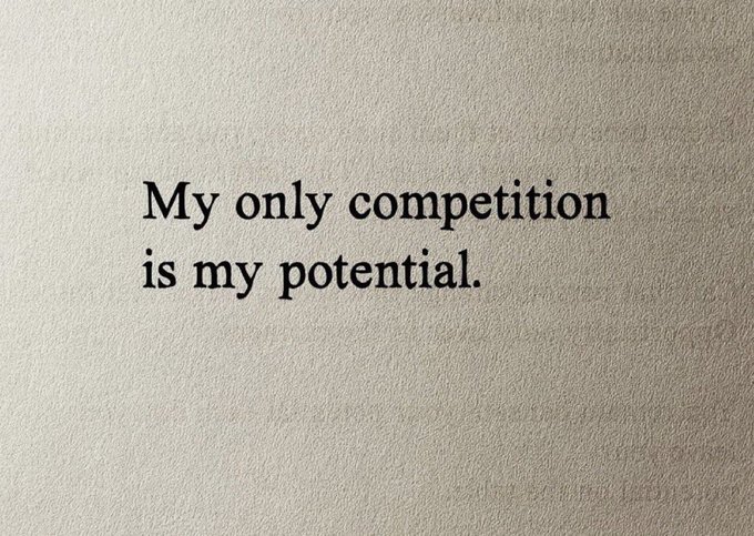 The image features a quote that reads "My only competition is my potential." The quote is written in black text against a white background, which makes it stand out prominently. The image also includes an image of a book with a gray cover, suggesting that this message might be related to a book or article about personal development and motivation.