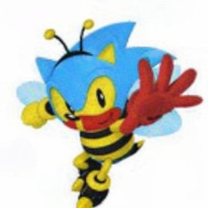 The image features a cartoon representation of a bee character with blue body, red antennae, yellow mouth, black stripes on its wings and legs, and a honeycomb patterned head featuring a small yellow eye and a white nose. The bee is shown in mid-flight with arms raised above its body, creating the impression that it's about to take off or land. The post associated with this image is titled "Day 406 of sharing a #harrypotterobamasonic10inu meme til it hits $10". This post could be used for promoting or reviewing a Harry Potter-themed item or event related to the bee character in the image, such as a toy, book cover, or video game.