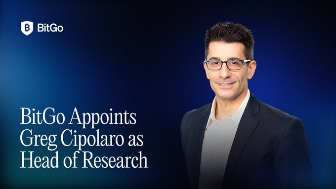 The image is a professional announcement graphic with a blue gradient background, featuring a headshot of a smiling man with dark hair and glasses wearing a dark blazer over a gray shirt. The BitGo logo appears in the top left corner, and the text "BitGo Appoints Greg Cipolaro as Head of Research" is prominently displayed on the left side, corresponding to the post's announcement of Greg Cipolaro joining BitGo to lead its new BitGo Research division following the NYDIG acquisition.