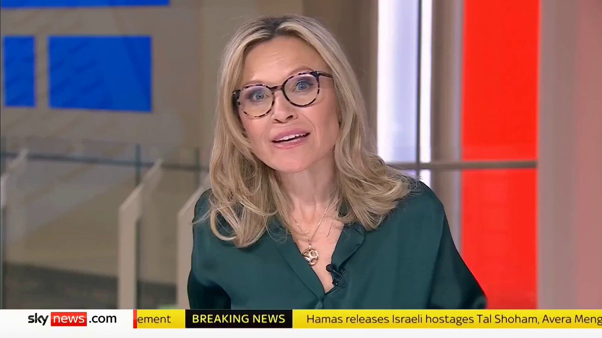 The image shows a woman wearing glasses and a green blouse with her face prominently displayed against a gray background. The text "SnowMind" can be seen, which suggests that she might be discussing financial news or analysis related to cryptocurrency markets.