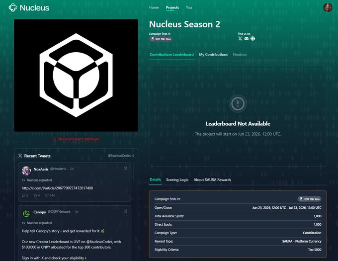 A screenshot of a webpage showcasing a logo, with the text "Nucleus Season 2" displayed at the top. The theme appears to be dark and includes green elements such as cubes and diamonds. A discussion thread titled "Nucleus Season 2 Loading..." is visible on the screen, with an estimated time of about 32 days from when it was posted (June 23rd). This post seems to revolve around a gaming event featuring various games, including Minecraft. There's also information available for those interested in participating or receiving rewards by signing up at the provided URL.