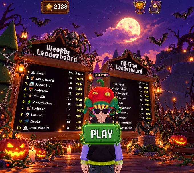 A Halloween-themed game leaderboard screen featuring a character in a pumpkin hat with sunglasses, displaying 'Weekly Leaderboard' with user JayElf at #1 (score 7655) and 'All Time Leaderboard', plus a 'PLAY' button.