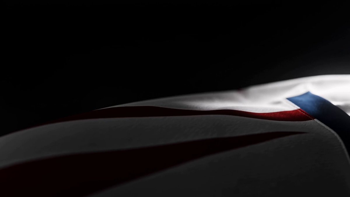 The image features a close-up of an American flag with red, white, and blue stripes. It appears that someone has taken a photo of this flag, possibly for use in promoting World Cup tickets or merchandise related to the event. The text "World Cup tickets are available now on Avalanche Team1 USA jerseys coming soon..." suggests that these tickets might be exclusively sold through Avalanche Team1 USA's website, and they are offering them as part of their World Cup promotion.