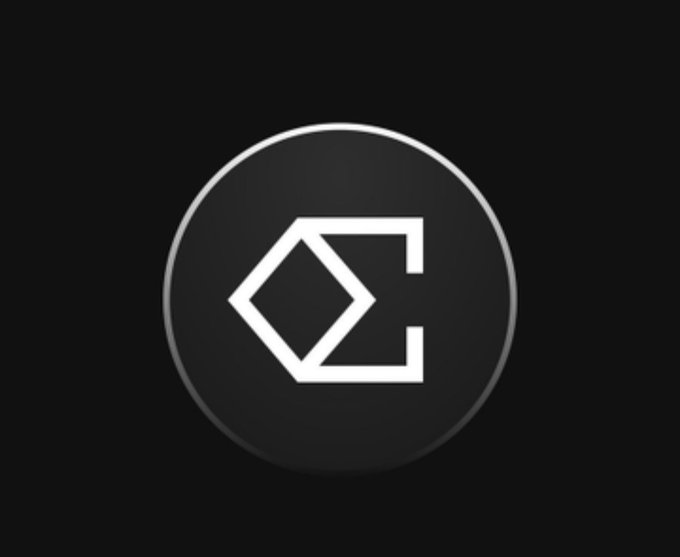 A black circular logo featuring a stylized white geometric design resembling a diamond shape merged with a letter 'C'.