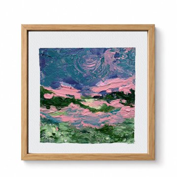A framed impasto-style landscape painting depicts a green field under a swirling pink and blue sky.