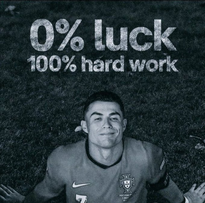Black-and-white photo of Cristiano Ronaldo in a Portugal jersey lying on grass, overlaid with the text '0% luck 100% hard work'.