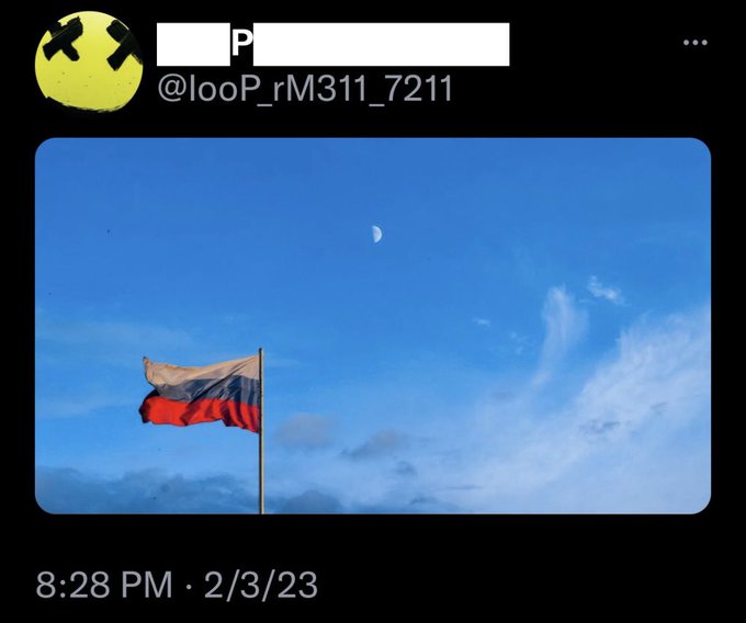 A screenshot of a tweet from user @looP_rM311_7211 posted at 8:28 PM on 2/3/23 shows a Russian flag waving against a blue sky with a crescent moon visible. The accompanying post references XRP and Russia's national animal, the bear, tagging @bearableguy123 and @321yugelbaraeb.
