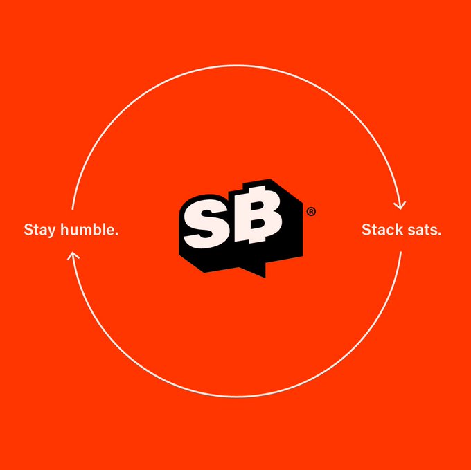 The image features a red background with two black text boxes positioned at the center of the circle. One box contains the phrase "stay humble", while the other reads "Stack sits." The words "SBB" are also present, likely representing the company's name or logo.