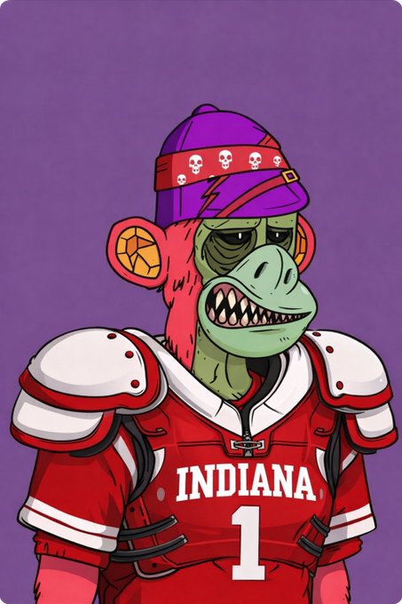 A cartoon illustration of a Bored Ape-style monkey dressed in red Indiana #1 football shoulder pads and a purple skull-patterned beanie on a purple background.