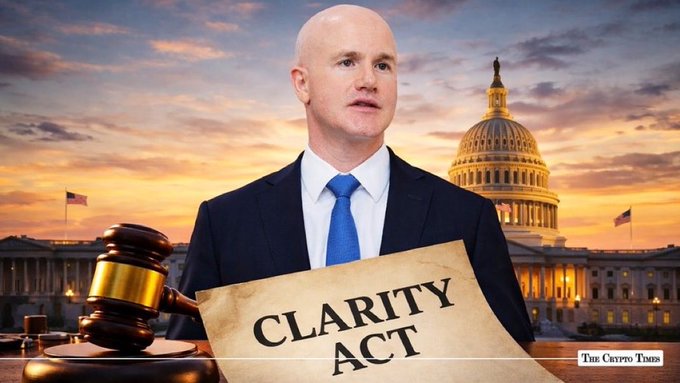 An image of a man in a suit standing before the U.S. Capitol building, holding a document labeled 'CLARITY ACT', with a judge's gavel in the foreground and 'The Crypto Times' watermark.
