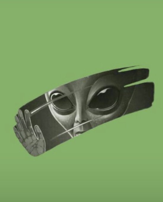 The image features a cartoon alien with large eyes, giving it an ethereal appearance. It appears as if the alien is peeking out from behind a brush stroke or a piece of paper, creating a sense of mystery. The background color is green, which contrasts nicely with the black and white elements in the image. The caption "Good morning guys We go again today……. Still on @TermMaxFi" suggests that this image might be related to an ongoing series or account on social media platforms like Twitter or Instagram.