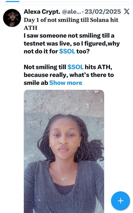 The image shows a woman with dreadlocks, wearing a black shirt, lying down on her stomach against a brick wall. She has a message posted on social media that reads "Day 1 of not smiling until Solana hitATH I saw someone not smiling til a testnet was live so I figured why not do it for $SOLO too?". The woman's position and the context of the post suggest she is participating in an online challenge or promoting a cause related to the message posted.